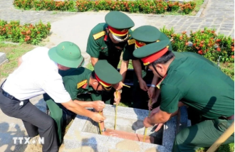 Kon Tum reburies soldiers’ remains found in Laos, Cambodia 